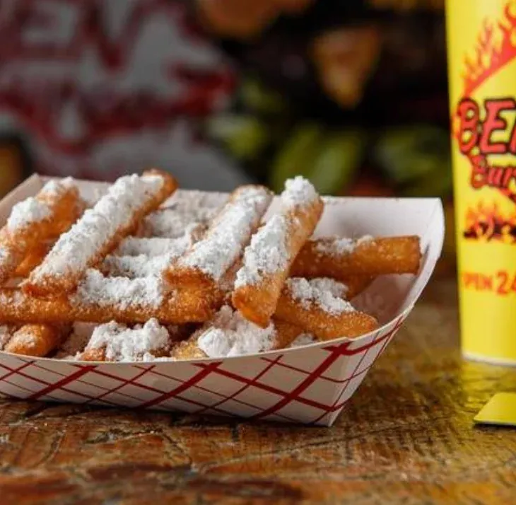 Funnel Cake Fries - Sweet funnel cake fries with powdered sugar
