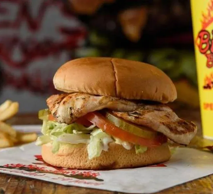Grilled Chicken Sandwich - Tender grilled chicken breast with fresh lettuce, tomato, and mayo